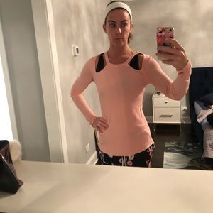 Top with asymmetrical slits at collarbone